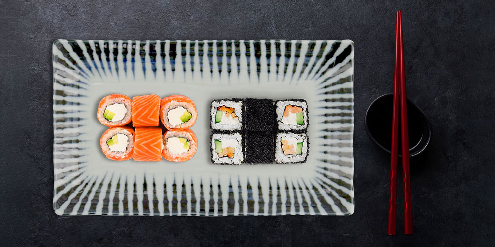 Sushi set with plate, sauce bowl and chopsticks